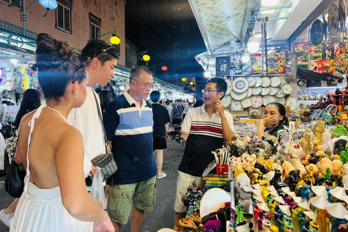 Handmade seashell jewelry and woven bags sold at Nha Trang Night Market